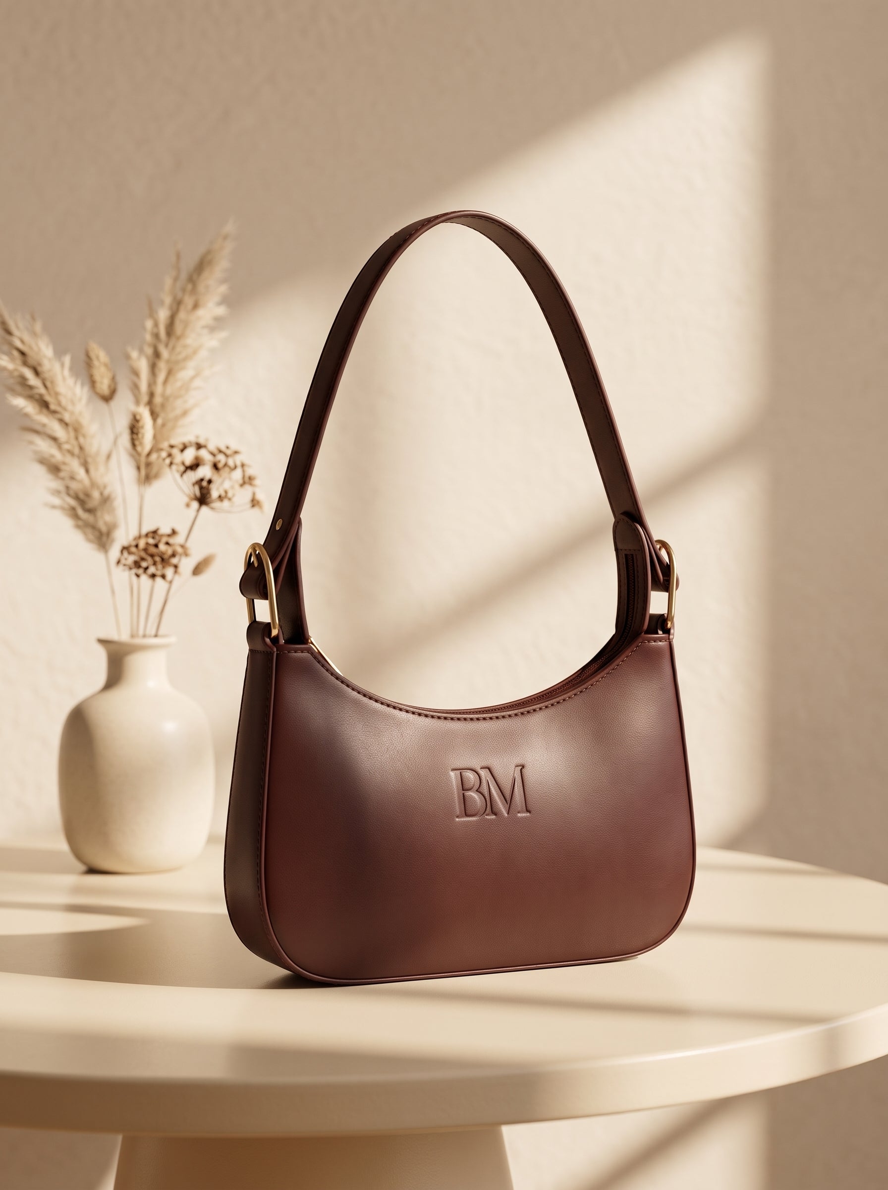 Chocolate brown leather shoulder bag for women, hobo handbag with embossed BM logo
